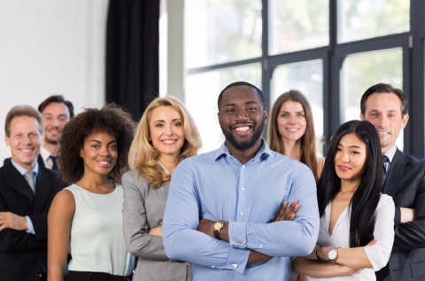 A group of people standing next to each other.